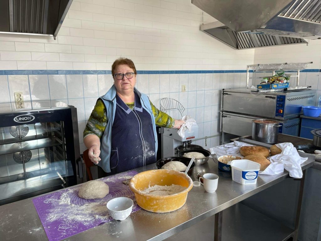 A lady hard at work in the new bakery.