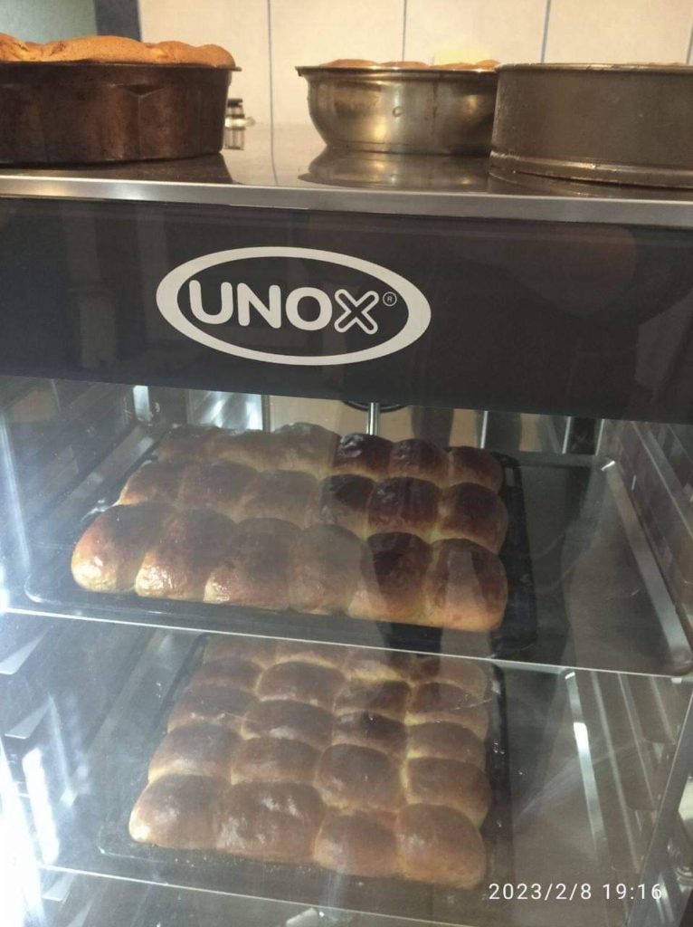 Bread baking in the oven at the new bakery