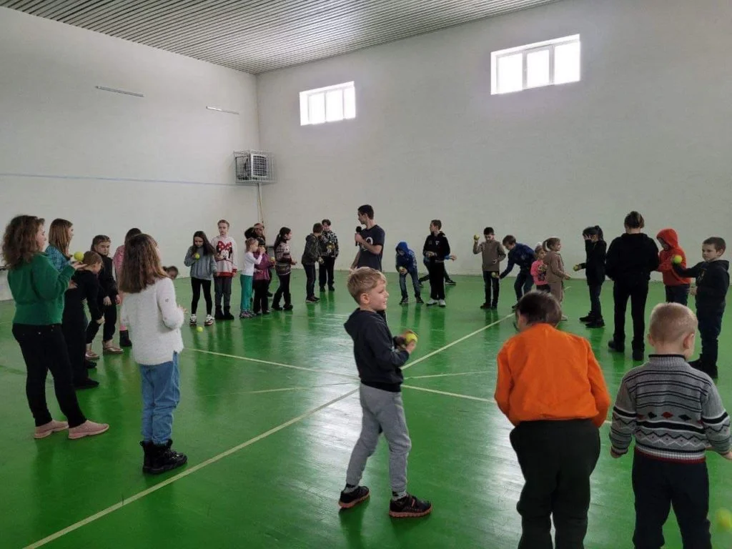 Children playing in the sports hall at the Centre.