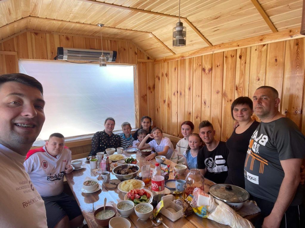 Bohdan and his family with Pastor Andrew and his family