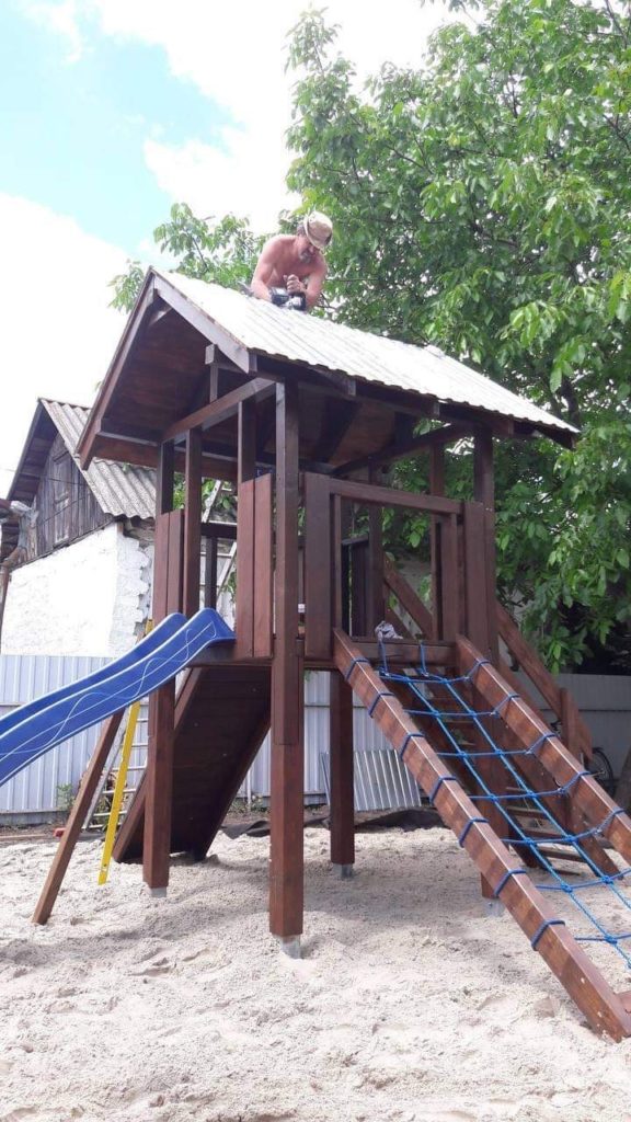 A children's playground slide in a newly installed playground