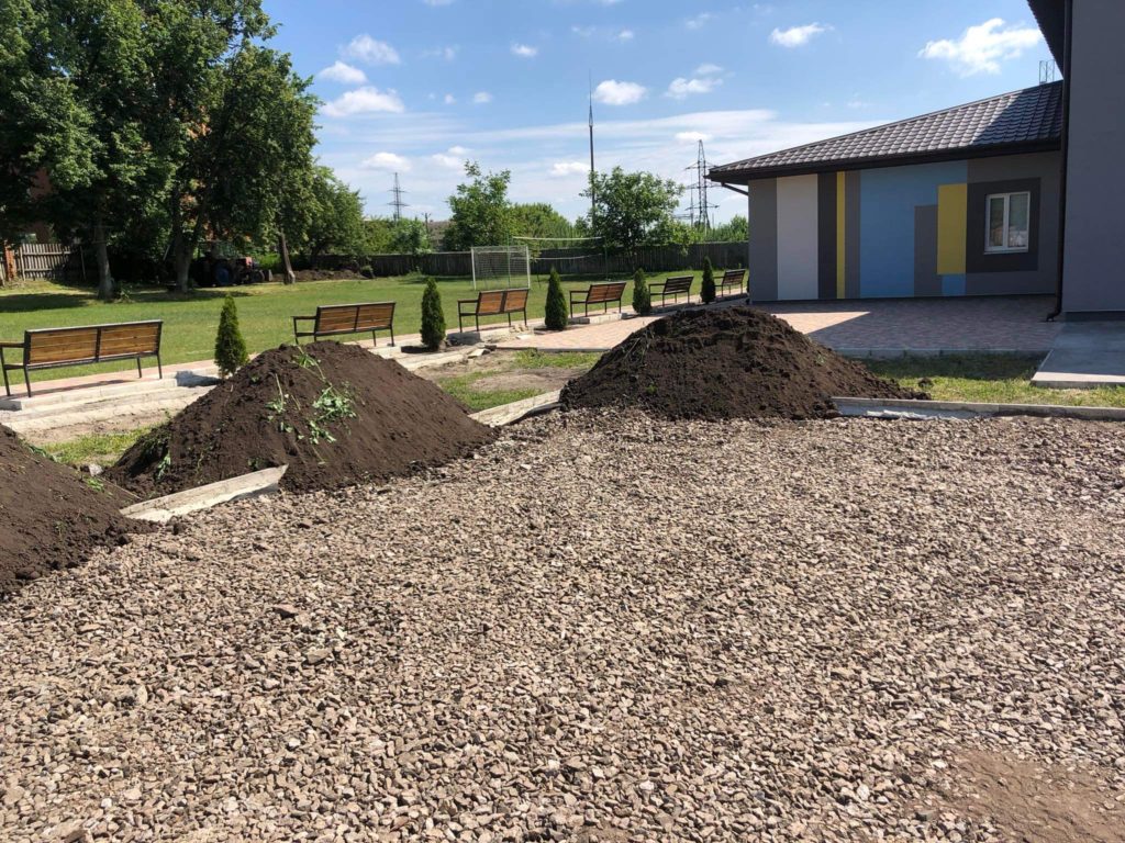 Piles of earth and hardcore in the area where the playground will be built