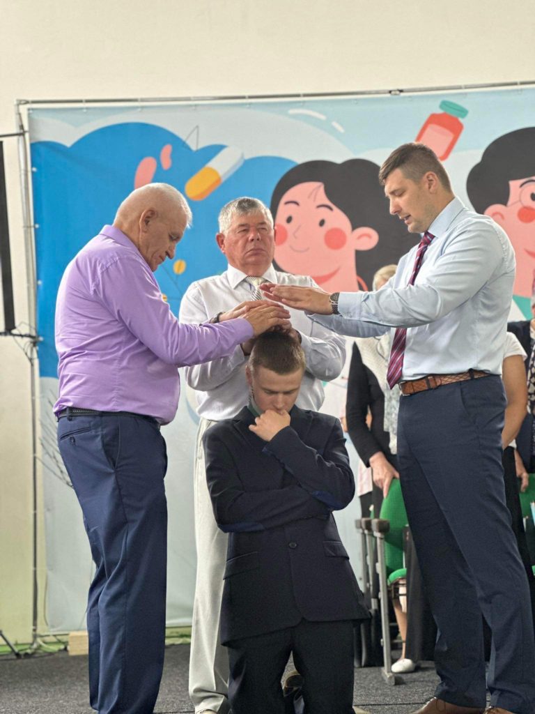 Famer Sergey being ordained by Bohdan