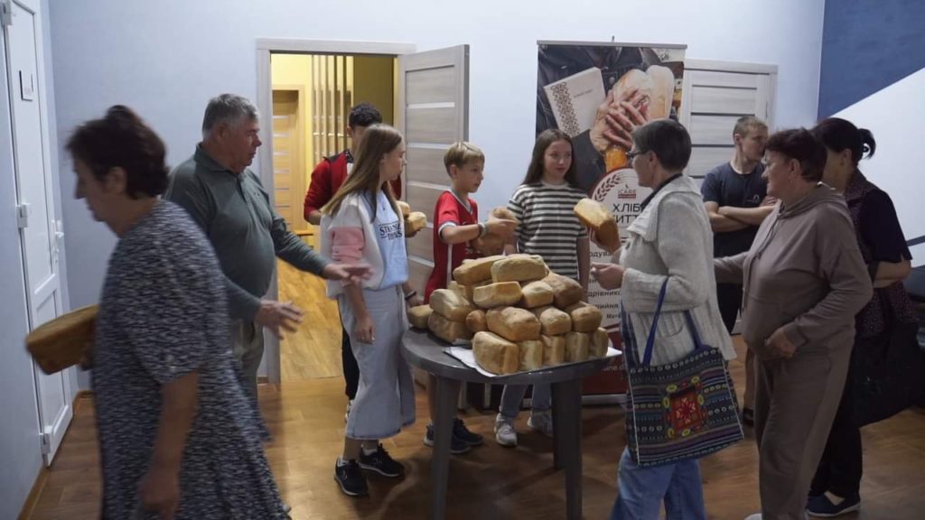 Freshly baked bread being handed out by the team at the Centre