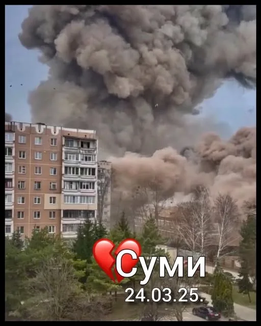 Clouds of dust and smoke billowing up from an explosion at Sumy hospital