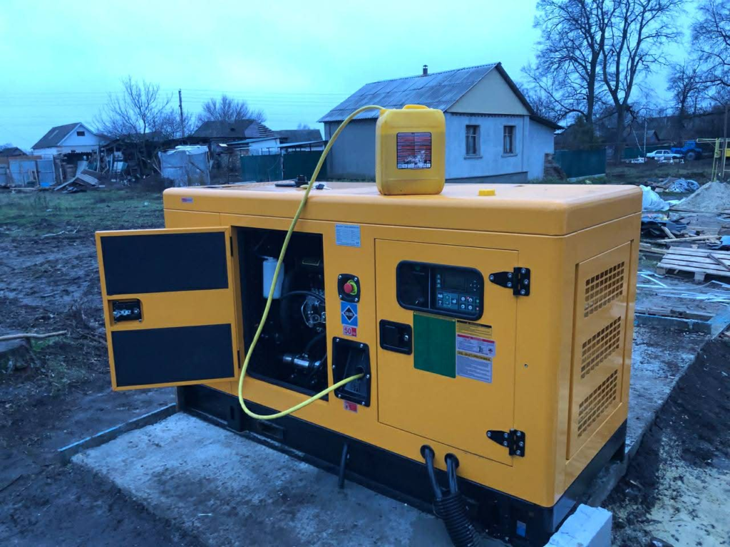 Large yellow backup generator installed at an orphanage in a rural Ukrainian village.