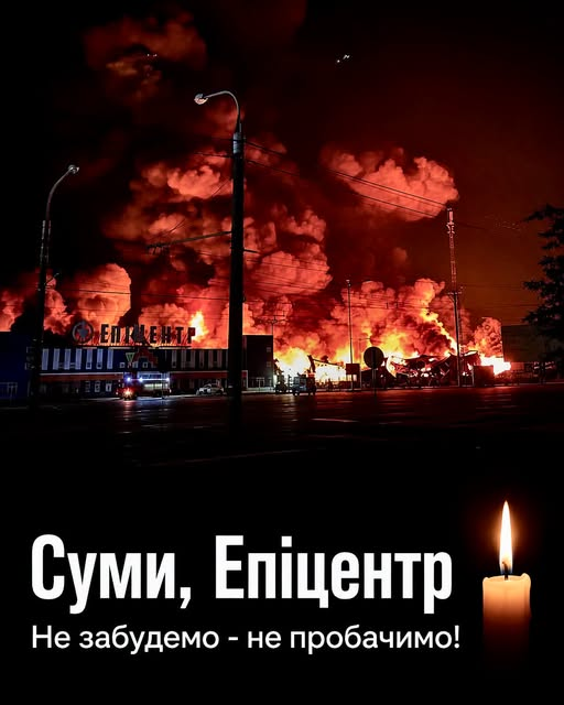 A large fire and thick smoke engulf the Epicentre shopping centre in Sumy following an attack, with a memorial candle and Ukrainian text below